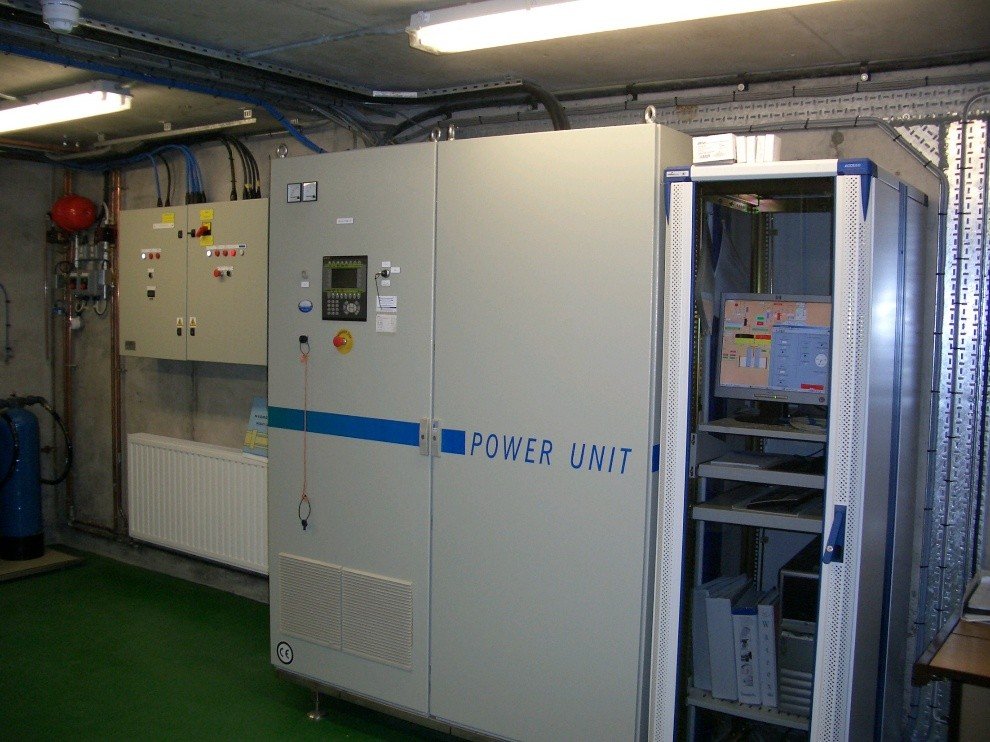 Power unit and control cabinet