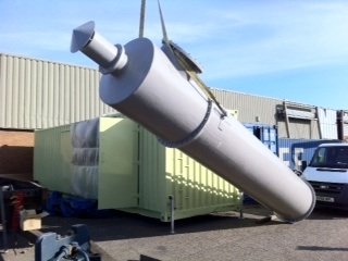 Raised process tower assembly